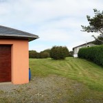 10-panoramic view of garage and house